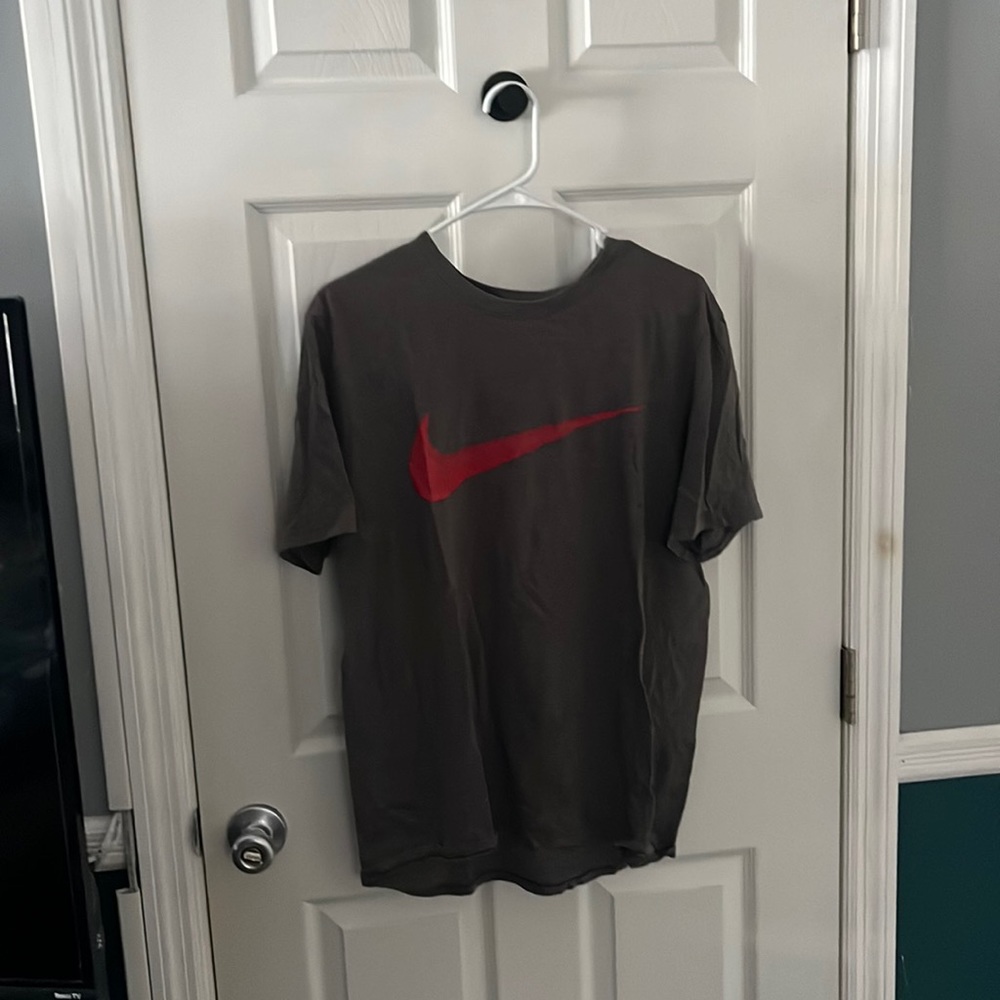 grey and red nike t-shirt.
